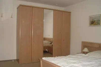 Ein Bett oder Betten in einem Zimmer der Unterkunft Am grooten Steen 20, Ferienwohnung 1