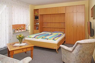 Ein Bett oder Betten in einem Zimmer der Unterkunft Haus Apart, Whg 1