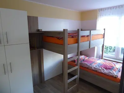 Ein Bett oder Betten in einem Zimmer der Unterkunft Haus Apart, Whg 1