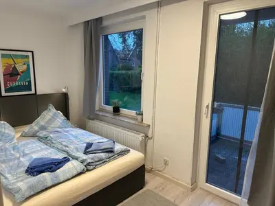 Ein Bett oder Betten in einem Zimmer der Unterkunft Haus Seefalke - 250 m zum Meer