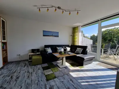 Ein Sitzbereich in der Unterkunft Ferienhaus Butendieksweg 99a