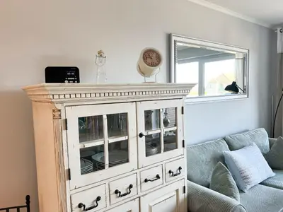 Ein Sitzbereich in der Unterkunft Haus Strandläufer Apartment 3 5 Strandgut