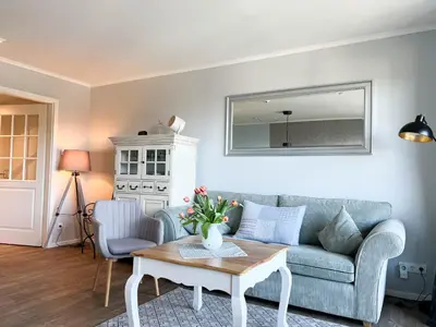 Ein Sitzbereich in der Unterkunft Haus Strandläufer Apartment 3 5 Strandgut