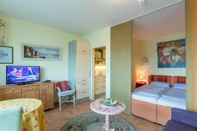 Ein Bett oder Betten in einem Zimmer der Unterkunft Haus Elisabeth, Whg 23