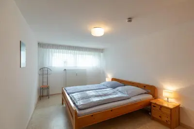 Ein Bett oder Betten in einem Zimmer der Unterkunft Haus Medemsand, Whg 206