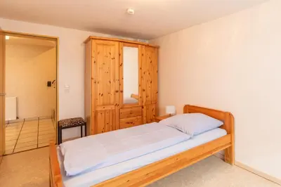 Ein Bett oder Betten in einem Zimmer der Unterkunft Haus Medemsand, Whg 206