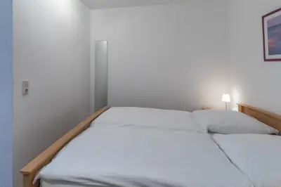 Ein Bett oder Betten in einem Zimmer der Unterkunft Haus Relax, Whg 1