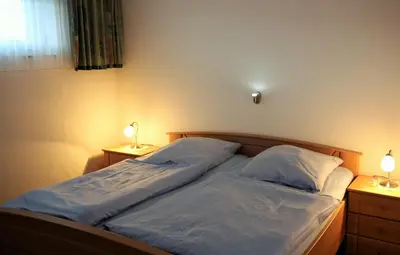 Ein Bett oder Betten in einem Zimmer der Unterkunft Haus Nautilus, Whg 1