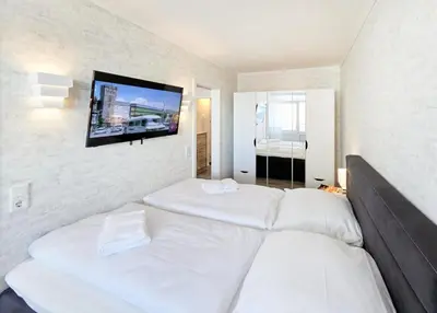 Ein Bett oder Betten in einem Zimmer der Unterkunft Frische Brise - 211