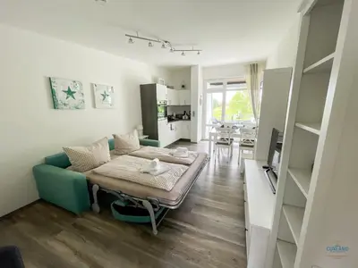 Ein Bett oder Betten in einem Zimmer der Unterkunft Haus Essen Duhnen Wohnung 10