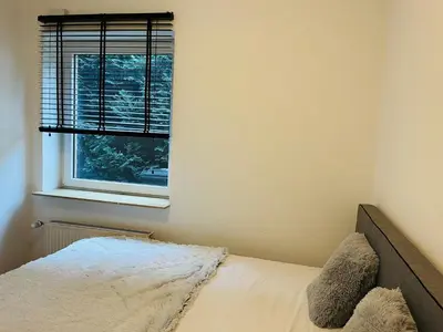 Ein Bett oder Betten in einem Zimmer der Unterkunft Diek Hus