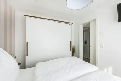 Ein Bett oder Betten in einem Zimmer der Unterkunft Haus Deichkieker Apartment 3 3 Wattläufer