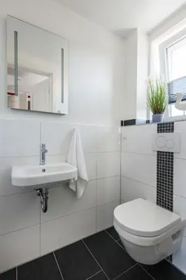 Ein Badezimmer in der Unterkunft Haus Deichkieker Apartment 4 2 Watt n Meer