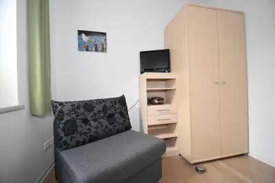 TV/Unterhaltungsangebot in der Unterkunft Haus Seehafen Apartment 0 1