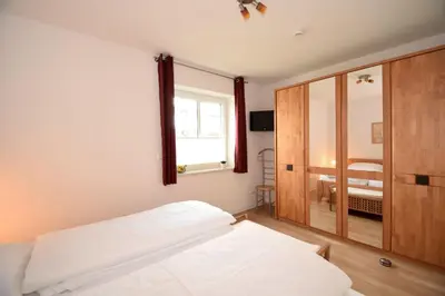 Ein Bett oder Betten in einem Zimmer der Unterkunft Haus Seehafen Apartment 0 1