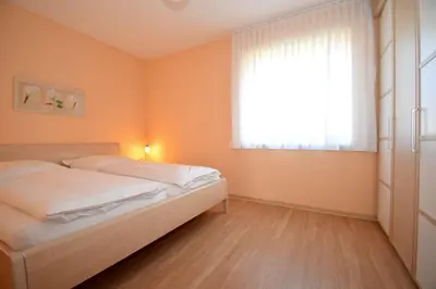 Ein Bett oder Betten in einem Zimmer der Unterkunft Haus Seehafen Apartment 1 1