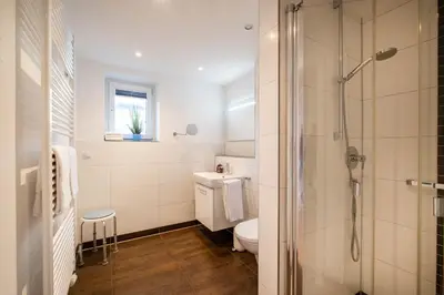 Ein Badezimmer in der Unterkunft Haus Seehafen Apartment 2 1
