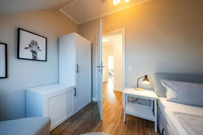 Ein Bett oder Betten in einem Zimmer der Unterkunft Haus Am Anker Wohnung 7