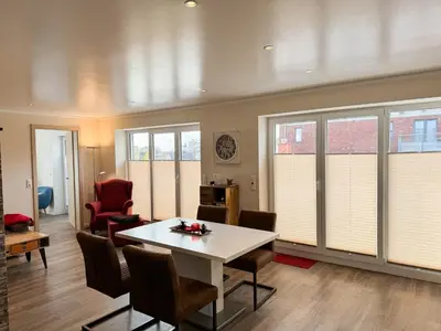 Ein Sitzbereich in der Unterkunft Sand & Meer Penthouse-Apartment 5