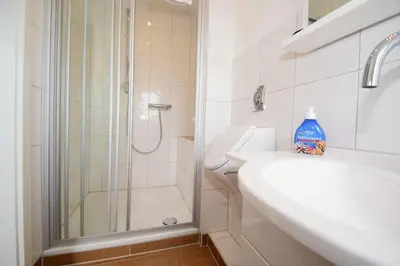 Ein Badezimmer in der Unterkunft Haus Seemeile Wohnung 3 8
