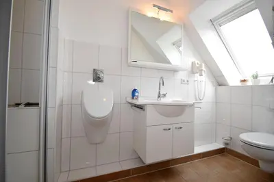 Ein Badezimmer in der Unterkunft Haus Seemeile Wohnung 3 8