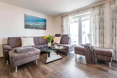 Ein Sitzbereich in der Unterkunft Haus Deichkieker Apartment 1 4