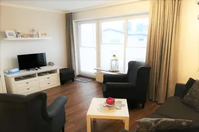 Ein Sitzbereich in der Unterkunft Haus Seemeile Wohnung 2 2