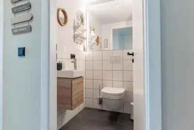 Ein Badezimmer in der Unterkunft Haus Strandläufer Apartment 3 1 Strandhaus 3 1