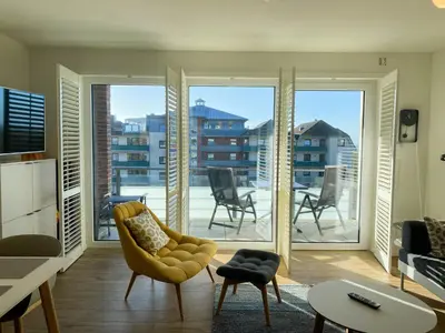 Ein Sitzbereich in der Unterkunft Haus Strandläufer Apartment 3 2 Strandhaus 3 2