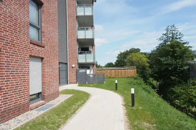 Ein Garten an der Unterkunft Haus Strandläufer Apartment 1 5