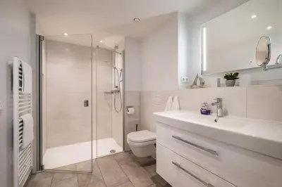 Ein Badezimmer in der Unterkunft Haus Strandläufer Apartment 4 3 Herzmuschel