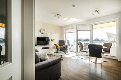 Ein Sitzbereich in der Unterkunft Haus Strandläufer Apartment 4 3 Herzmuschel