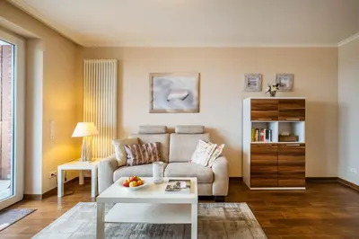 Ein Sitzbereich in der Unterkunft Haus Ankerplatz Apartment 1 2