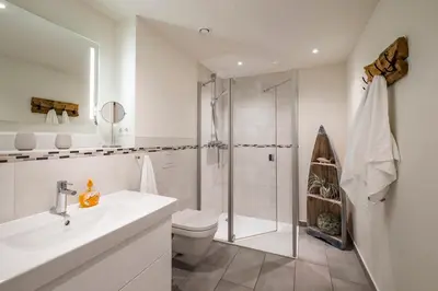 Ein Badezimmer in der Unterkunft Haus Strandläufer Apartment 0 3 Mirelle