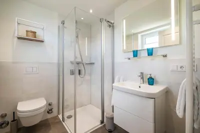 Ein Badezimmer in der Unterkunft Haus Strandläufer Apartment 0 6