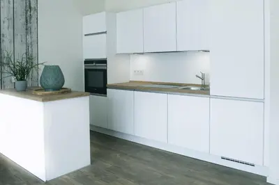 Küche/Küchenzeile in der Unterkunft Haus Strandläufer Apartment 0 5 Möövnest 3