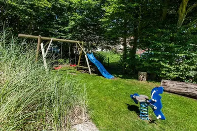 Ein Garten an der Unterkunft Büsumer Reethus Apartment 3 4