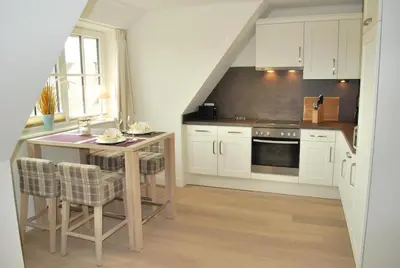 Küche/Küchenzeile in der Unterkunft Büsumer Reethus Apartment 3 4