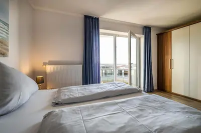 Ein Bett oder Betten in einem Zimmer der Unterkunft Haus Ankerplatz Apartment 3 1