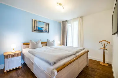 Ein Bett oder Betten in einem Zimmer der Unterkunft Büsumer Reethus Apartment 1 5