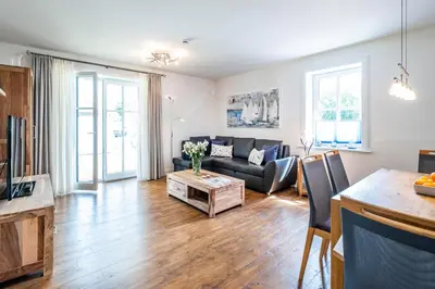 Ein Sitzbereich in der Unterkunft Büsumer Reethus Apartment 1 5
