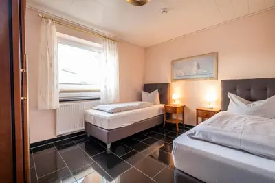 Ein Bett oder Betten in einem Zimmer der Unterkunft Haus Ankerplatz Apartment 3 6