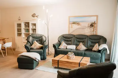 Ein Sitzbereich in der Unterkunft Büsumer Reethus Apartment 1 1