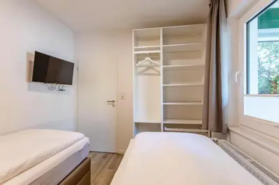 Ein Bett oder Betten in einem Zimmer der Unterkunft Haus Treibholz Apartment 2