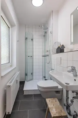 Ein Badezimmer in der Unterkunft Haus Treibholz Apartment 3