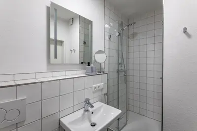 Ein Badezimmer in der Unterkunft Haus Treibholz Apartment 5
