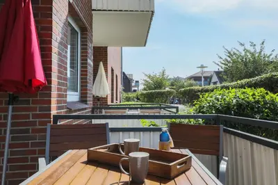 Ein Balkon oder eine Terrasse in der Unterkunft Haus Treibholz Apartment 10