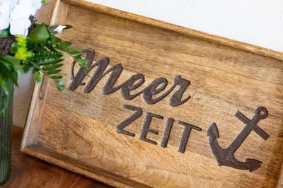 Ein Zertifikat, Auszeichnung, Logo oder anderes Dokument, das in der Unterkunft Haus Treibholz Apartment 10 ausgestellt ist