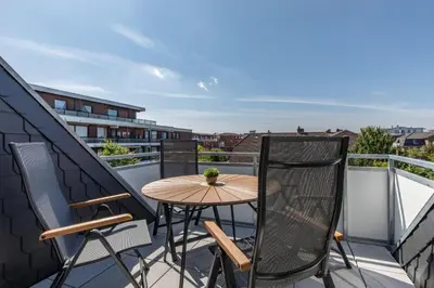Ein Balkon oder eine Terrasse in der Unterkunft Haus Treibholz Apartment 12