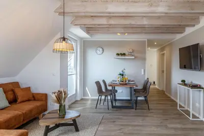Ein Sitzbereich in der Unterkunft Haus Treibholz Apartment 12